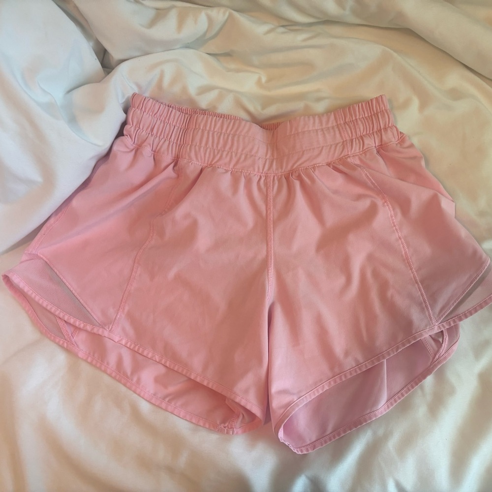 size 4 Lululemon bright light pink Hotty Hot shorts, Great condition like new